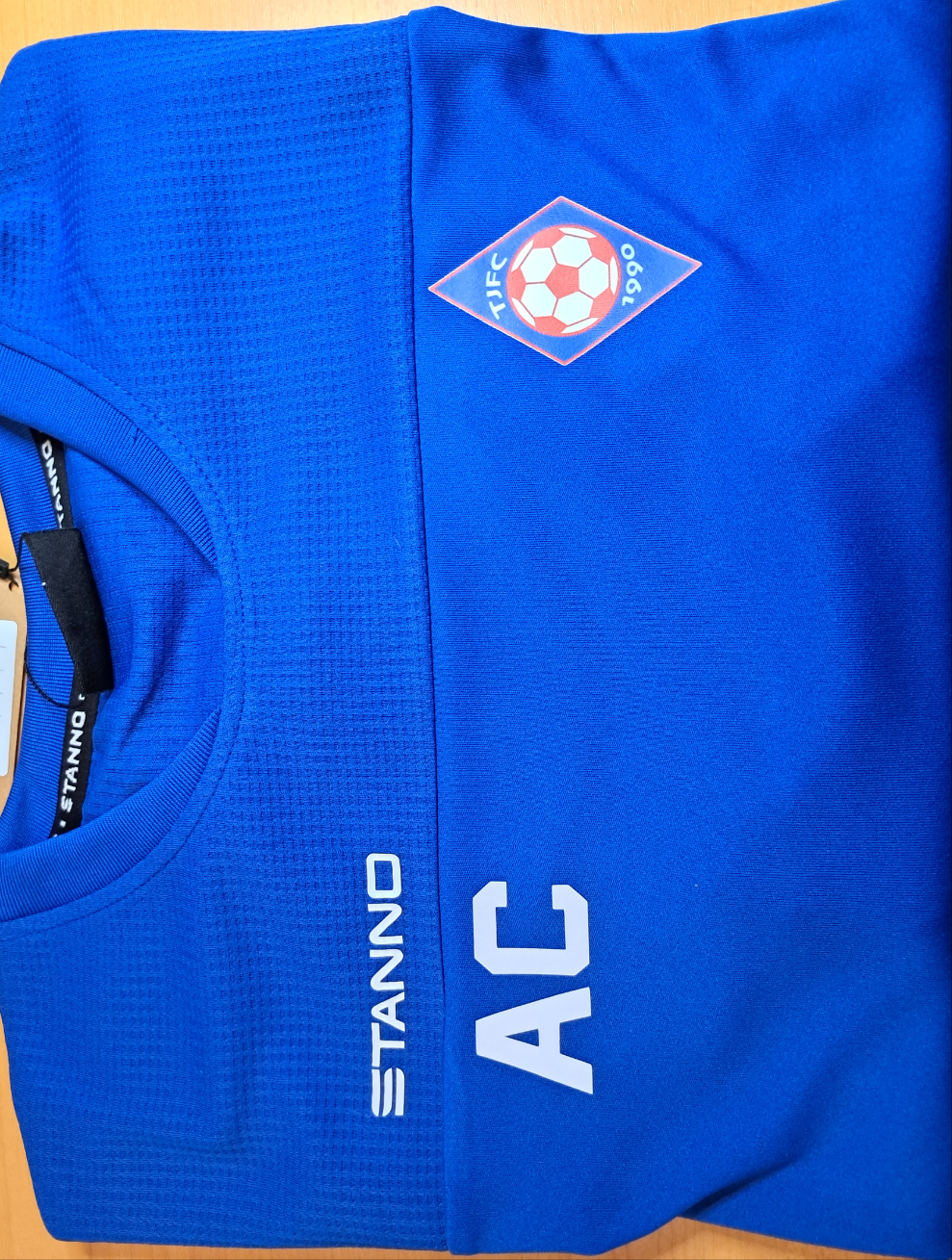 Badge, sponsor and number