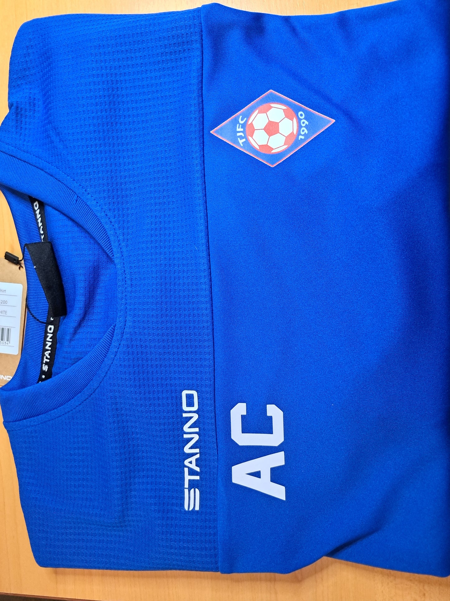 Badge, sponsor and number